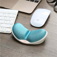 Ergo Memory Foam Mouse Pad with Wrist Support positioned next to a keyboard and mouse on a wooden desk.